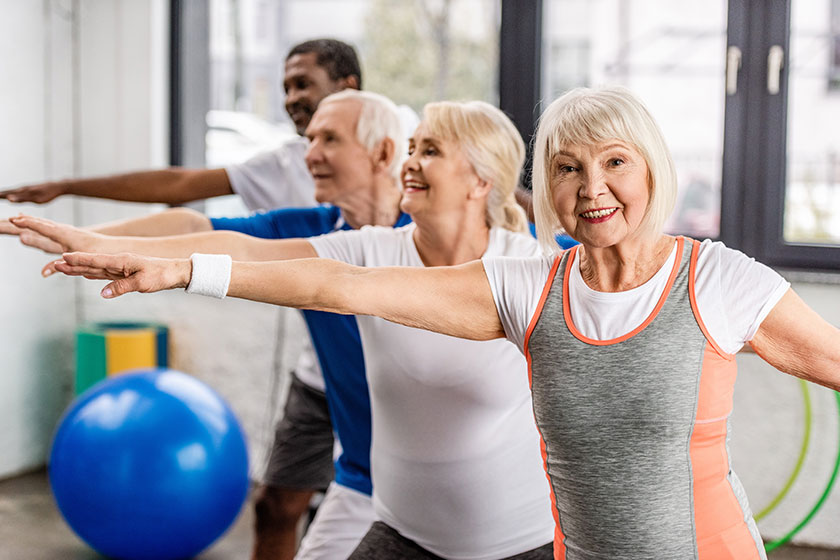 happy senior multiethnic sportspeople synchronous exercising sports hall happy senior multiethnic sportspeople synchronous exercising sports hall
