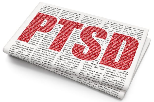 medicine concept ptsd on newspaper background