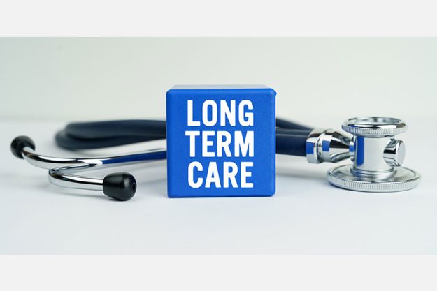 medicine health concept table stethoscope blue cube inscription long term medicine health concept table stethoscope blue cube inscription long term