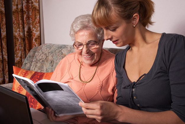 an old woman with a laptop