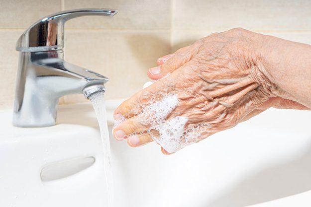 elderly woman hands washing hand hygiene prevent infection take care