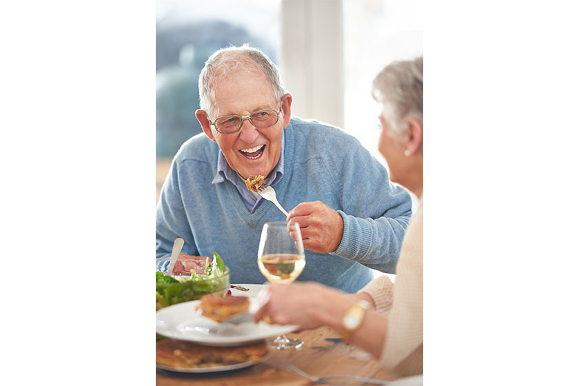 food fuel senior couple eating lunch together
