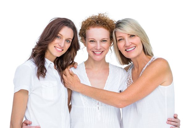 happy middle age women hug look camera city street female