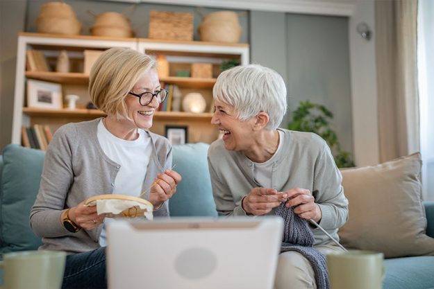 mother and daughter knitting and embroidery during leisure time mother and daughter knitting and embroidery during leisure time