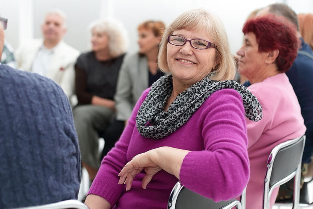 motivated diverse business team meeting posing front