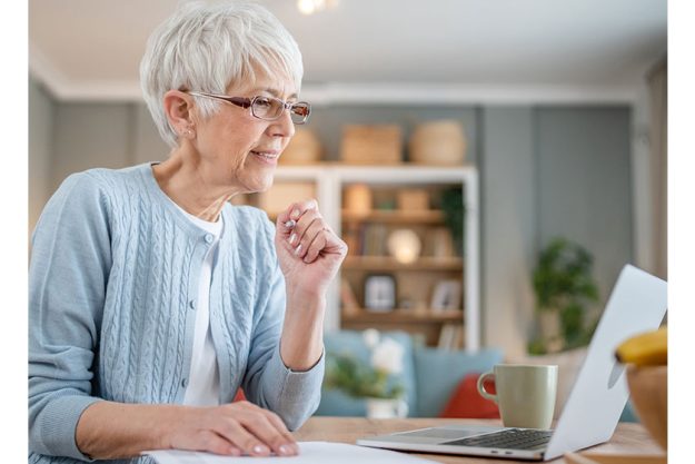 senior caucasian woman use laptop senior caucasian woman use laptop