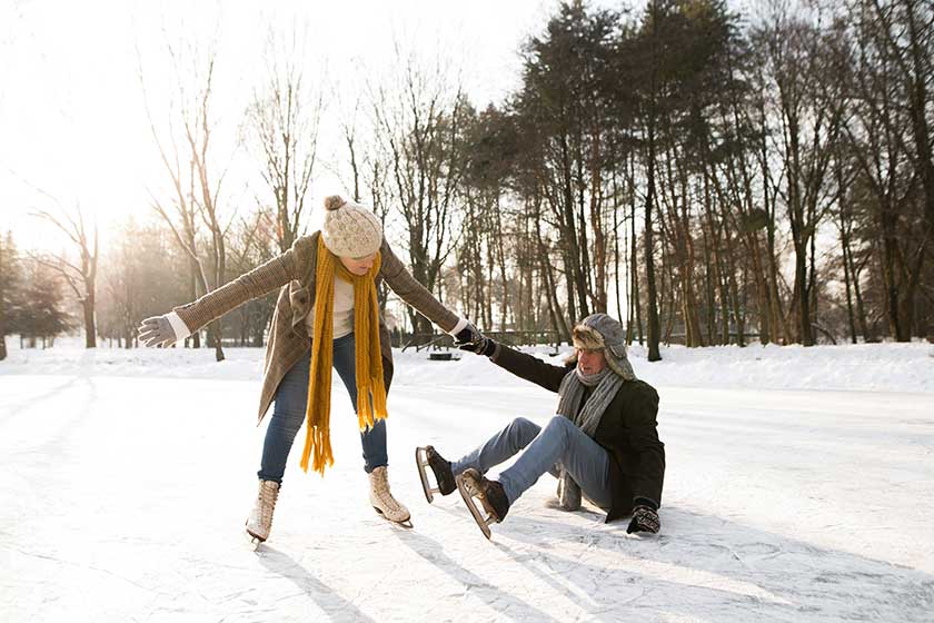 senior couple in sunny winter nature ice skating senior couple in sunny winter nature ice skating