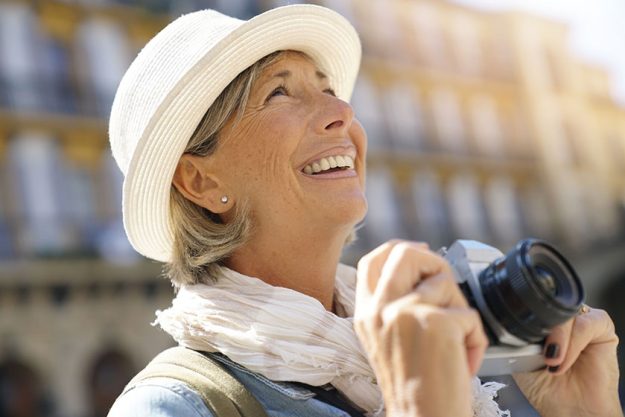 senior woman taking pictures