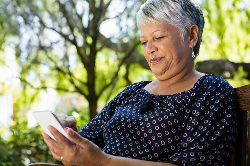 senior woman using mobile phone senior woman using mobile phone