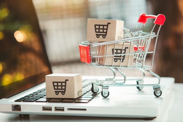 shopping online cardboard box shopping cart logo trolley laptop keyboard