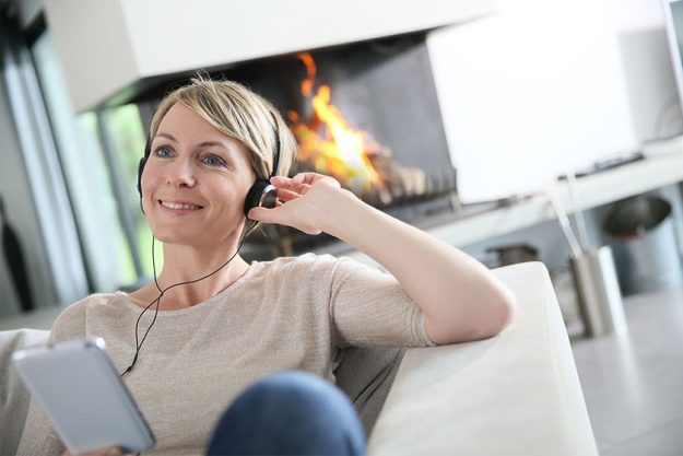 woman listening to music with smartphone