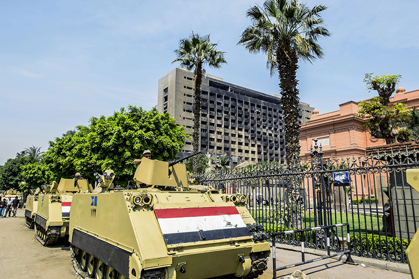 armoured vehicles and soldiers in front of the national museum