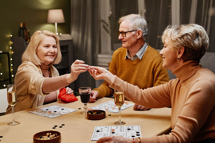 old people playing board game