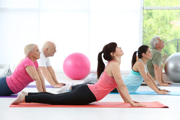 people practicing yoga