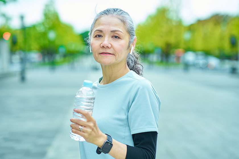 senior woman drinking water plastic bottle outdoors senior woman drinking water plastic bottle outdoors