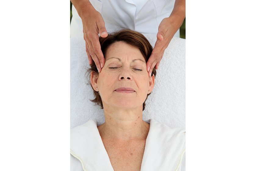 senior woman on massage bed