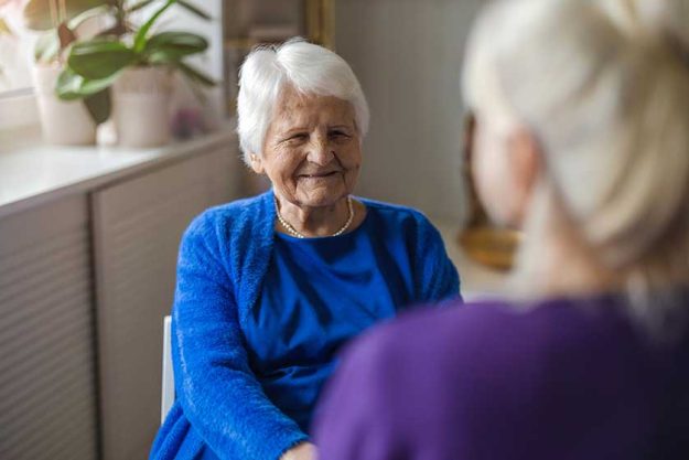 woman spending time her elderly mother home