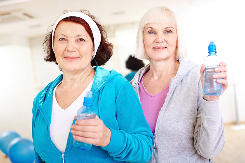 women with plastic bottles women with plastic bottles