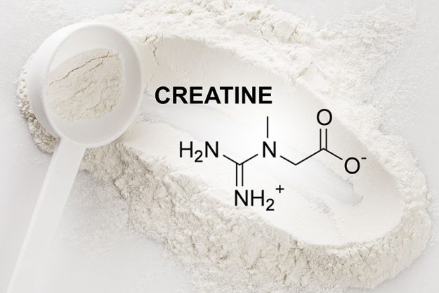 closeup scoop creatine monohydrate supplement chemical formula