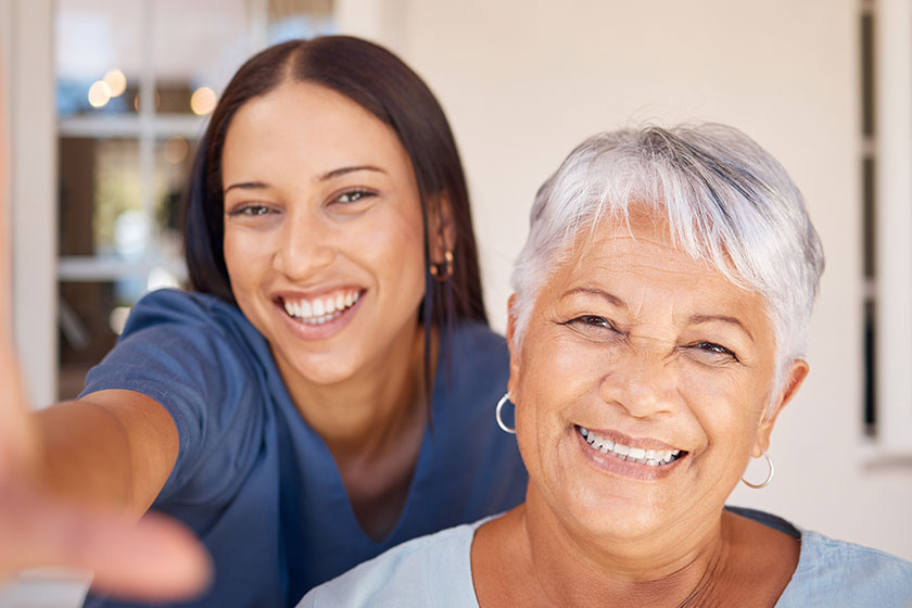healthcare doctor selfie portrait elderly patient living room bonding checkup healthcare doctor selfie portrait elderly patient living room bonding checkup