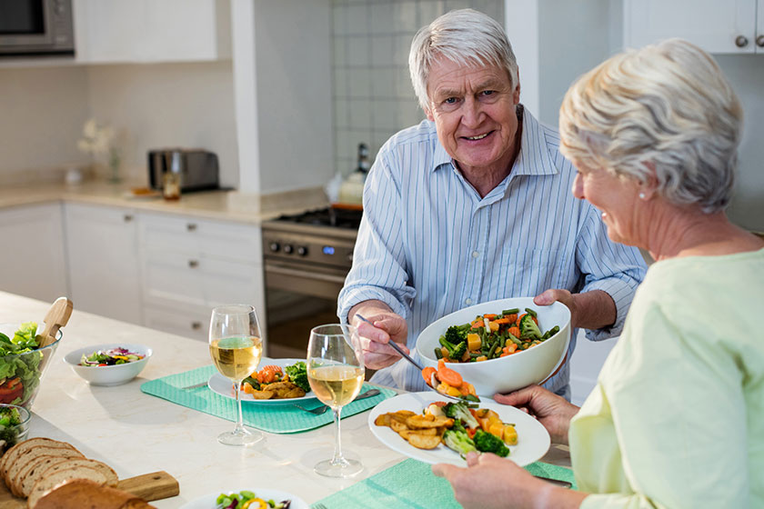 senior couple having meal together