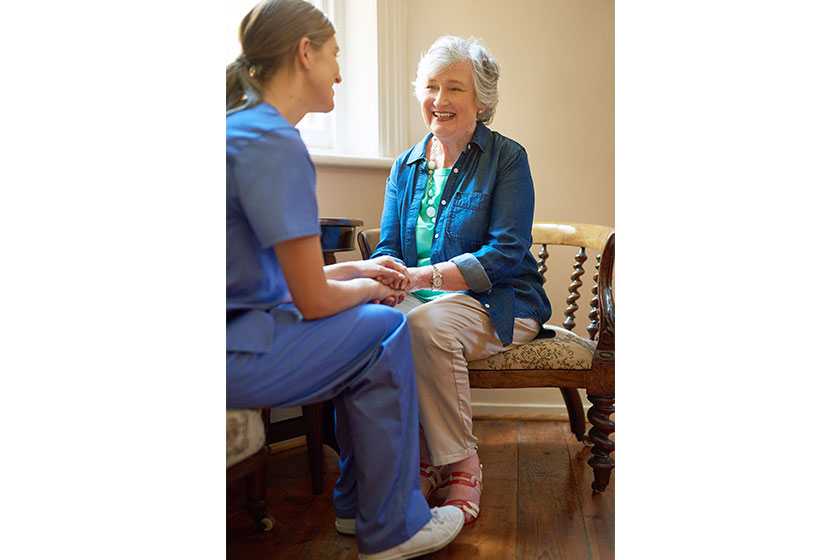 shes grateful for the support shot of a resident being consoled by a nurse in