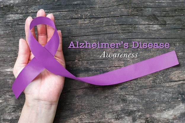 alzheimer disease awareness purple ribbon clipping path helping hand support alzheimer disease awareness purple ribbon clipping path helping hand support