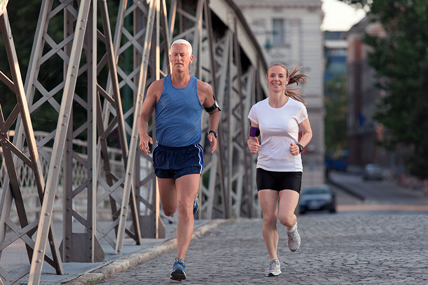 couple jogging on sunny day couple jogging on sunny day