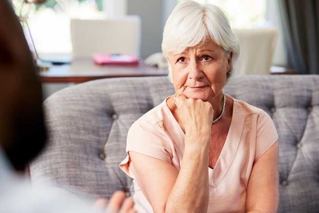 depressed senior woman having therapy psychologist depressed senior woman having therapy psychologist