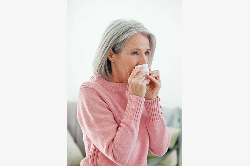 elderly person with rhinitis