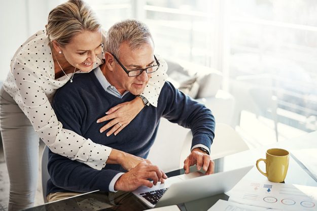 enjoying secure retire thanks sound financial planning mature couple using enjoying secure retire thanks sound financial planning mature couple using