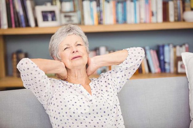 senior woman suffering from neck pain