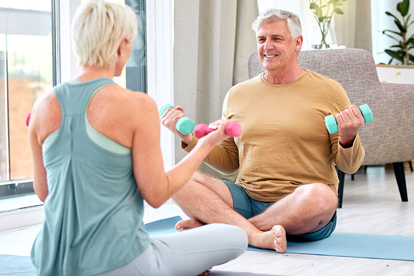 fitness elderly couple dumbbell exercise wellness muscle training mat happiness