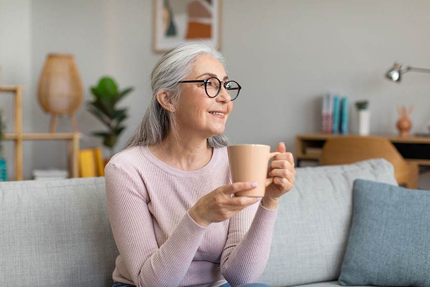 smiling pretty caucasian aged gray haired woman glasses resting enjoying smiling pretty caucasian aged gray haired woman glasses resting enjoying