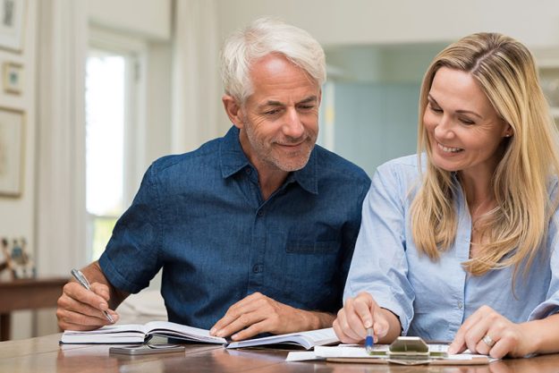 Couple discussing home economics Couple discussing home economics