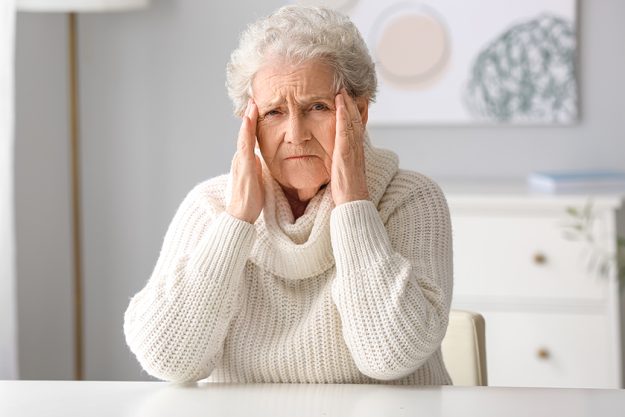elderly woman video chatting doctor home