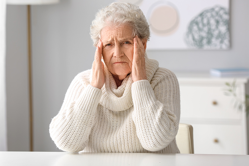 elderly woman video chatting doctor home