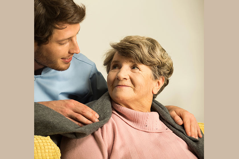 male nurse caring about retiree