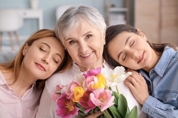 mature woman her adult daughter mother beautiful flowers home mature woman her adult daughter mother beautiful flowers home