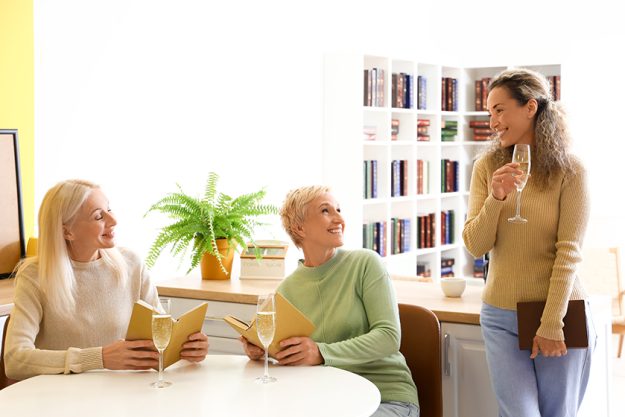 mature women champagne taking part book club home