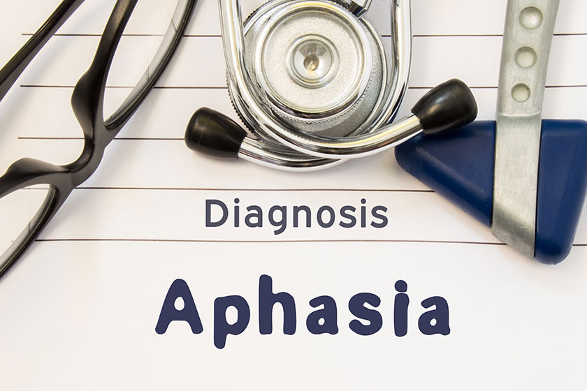 neurological diagnosis of aphasia neurological hammer stethoscope and doctors glasses lie on doctor workplace