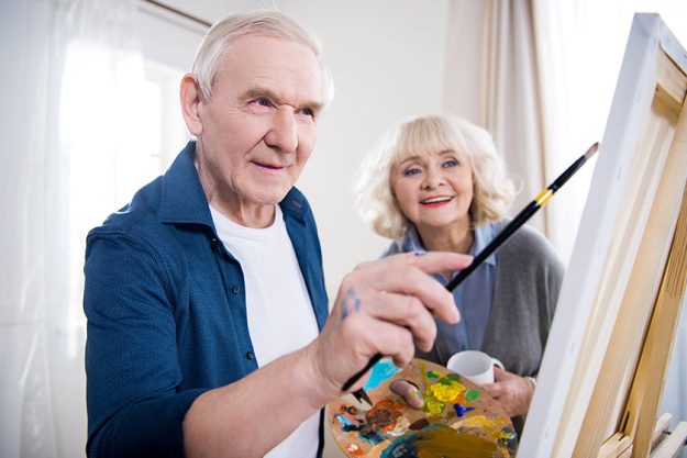 Senior couple painting Senior couple painting