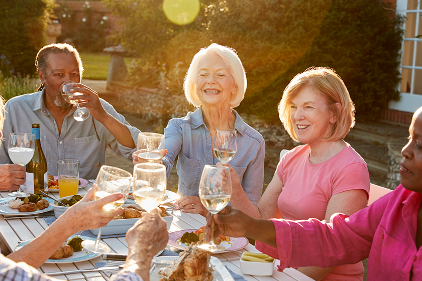 senior friends making a toast