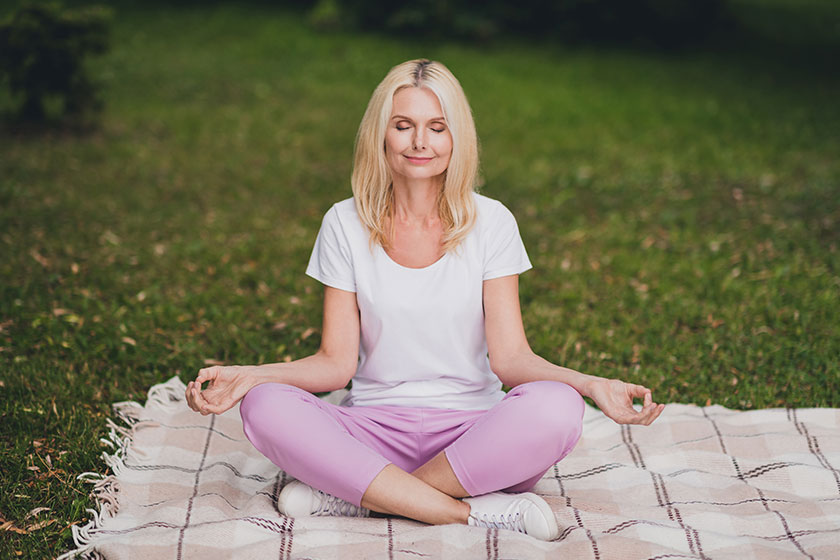 full body photo of aged rest blond lady sit wear t shirt trousers sneakers in full body photo of aged rest blond lady sit wear t shirt trousers sneakers in