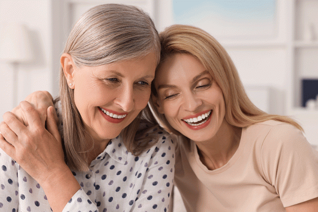 happy mature mother her daughter home