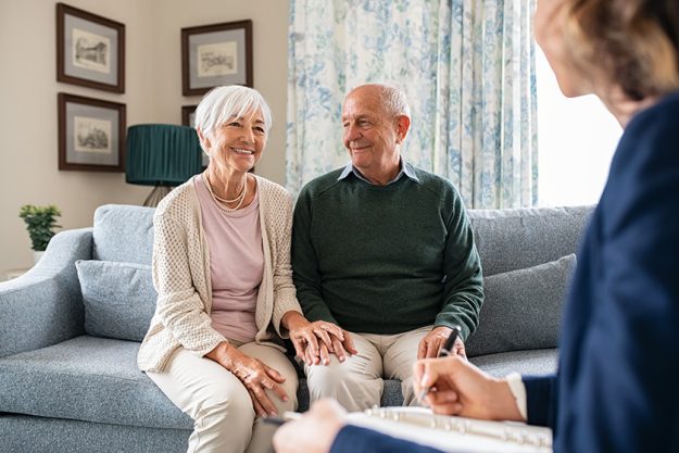 medical advisor home visit senior couple financial insurance agent holding medical advisor home visit senior couple financial insurance agent holding