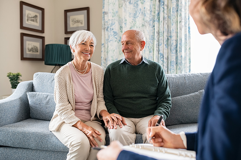 medical advisor home visit senior couple financial insurance agent holding medical advisor home visit senior couple financial insurance agent holding
