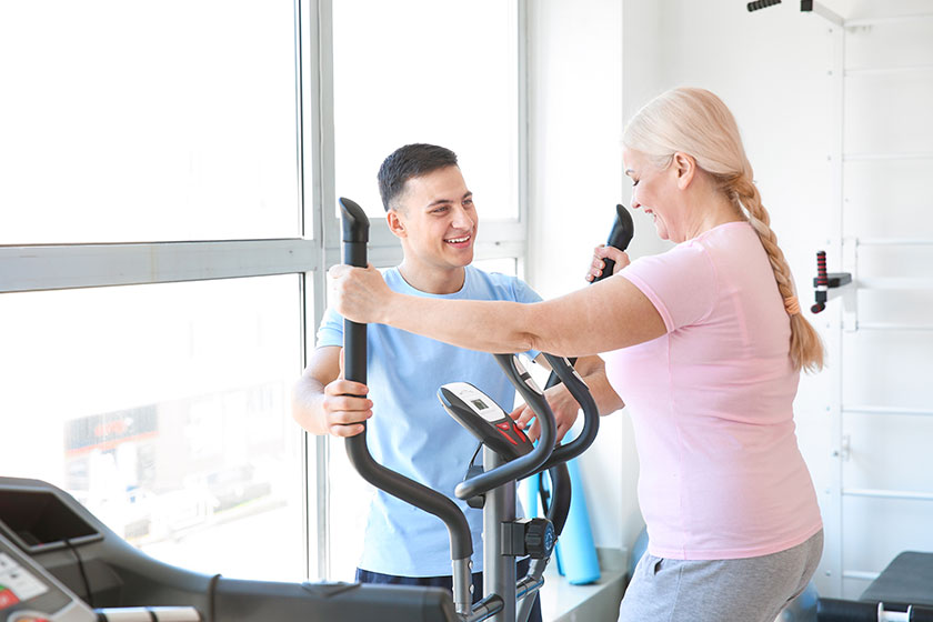 physiotherapist working with mature patient in rehabilitation center physiotherapist working with mature patient in rehabilitation center