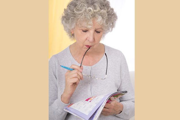 senior woman doing arrow words senior woman doing arrow words