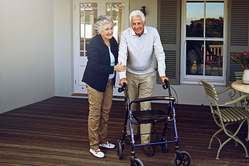 shes never far fromhis side portrait smiling senior man using